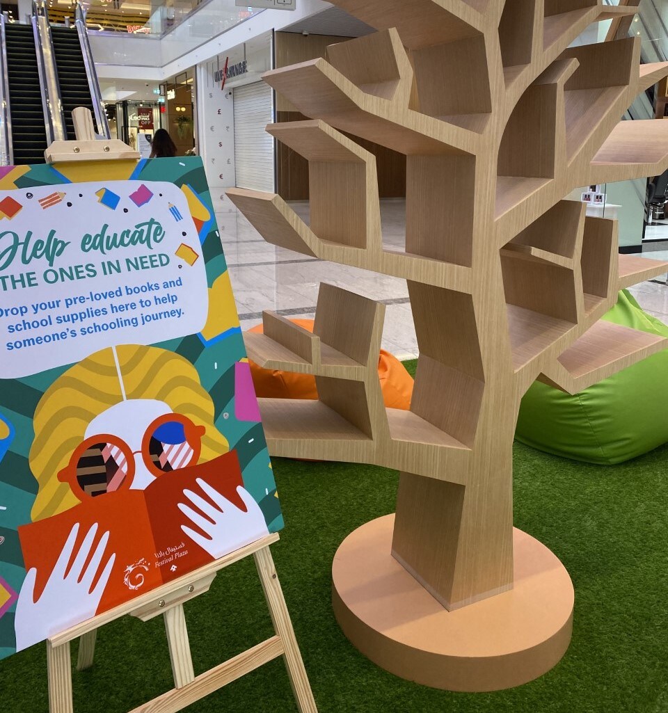 The Festival Plaza Tree of Knowledge Book Share program